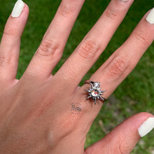 Load image into Gallery viewer, Adjustable silver engraved fidget ring on woman's hand with silver sun design for anxiety relief and stress management