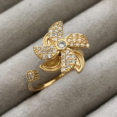 Adjustable gold fidget ring for women with windmill design for anxiety relief and stress management
